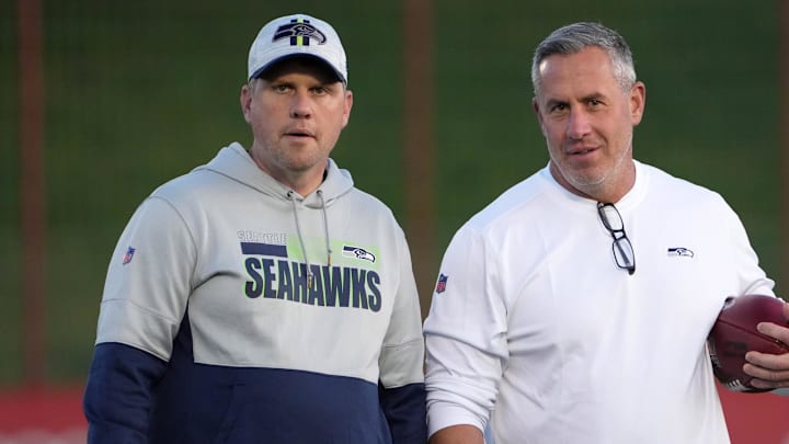 Nov 10, 2022; Munich, Germany; Seattle Seahawks offensive coordinator Shane Waldron (left) and tight ends coach Pat McPherson react during practice at FC Bayern Munich at Sabener Strabe.