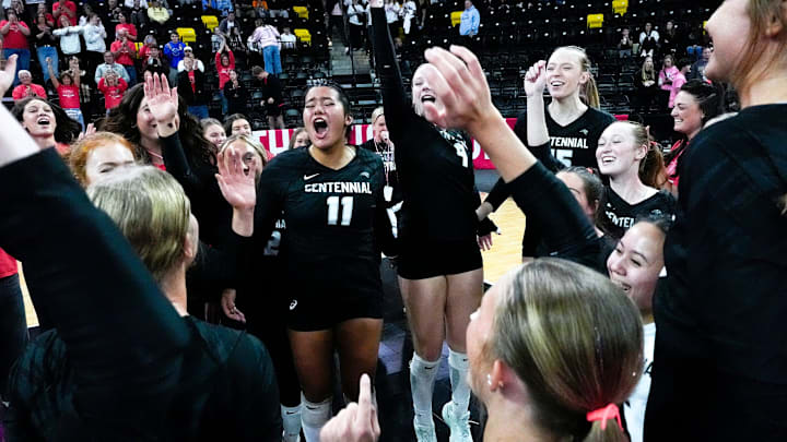 The Ankeny Centennial Jaguars celebrate after defeating Iowa City West Nov. 3, 2025 during the Class 5A Iowa high school state volleyball quarterfinals at Xtream Arena in Coralville, Iowa.