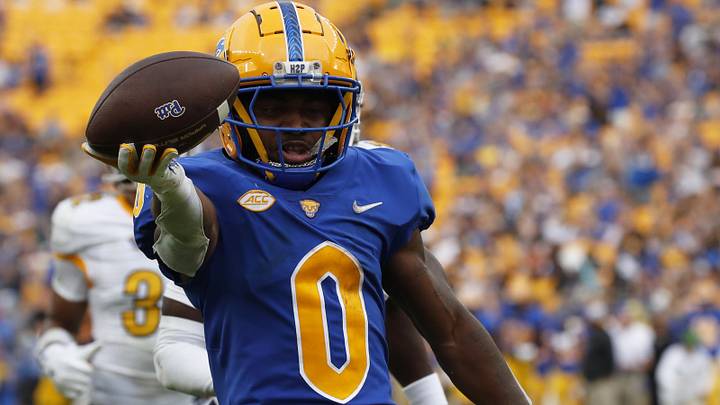 Pittsburgh Panthers running back Desmond Reid runs on his way to scoring a touchdown against the Kent State Golden Flashes. Pittsburgh Panthers running back Desmond Reid runs on his way to scoring a touchdown against the Kent State Golden Flashes.