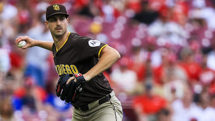 Bryan Hoeing throws to first to get Cincinnati Reds Santiago Espinal out in the sixth inning at Great American Ball Park.