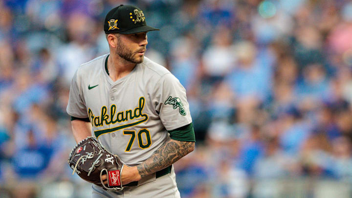 May 18, 2024; Kansas City, Missouri, USA; Oakland Athletics pitcher Lucas Erceg (70) throws during the seventh inning against the Kansas City Royals at Kauffman Stadium. Mandatory Credit: William Purnell-USA TODAY Sports