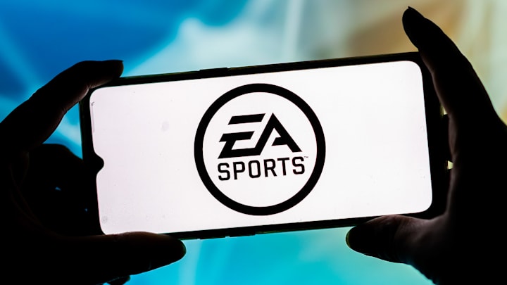 In this photo illustration a EA Sports logo seen displayed...