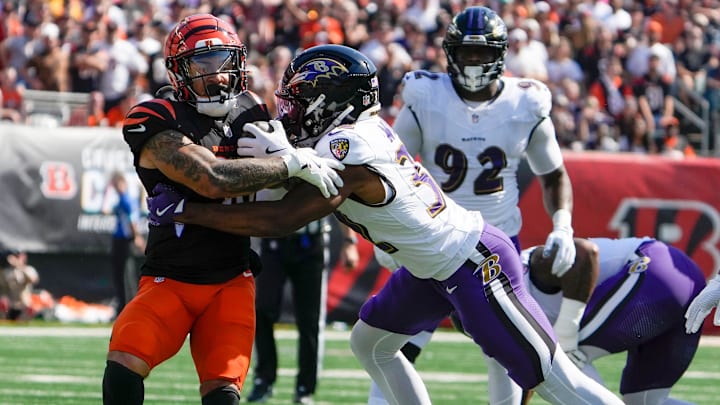 Cincinnati Bengals halfback Chase Brown (30) is stopped by Baltimore Ravens safety Marcus Williams (32) in the NFL Week 5 the Sunday October 6, 2024 at Payor Stadium.