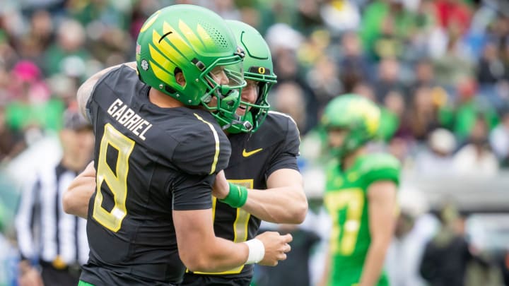 Oregon quarterback Dillon Gabriel congratulates Luke Moga after a touchdown by Mona during the Oregon Ducks’ Spring Game Saturday, April 27. 2024 at Autzen Stadium in Eugene, Ore.