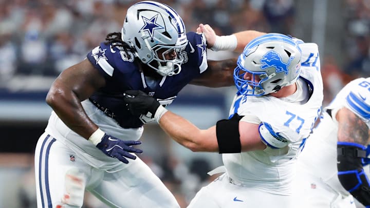 Dallas Cowboys defensive tackle Mazi Smith and Detroit Lions center Frank Ragnow battle at the line of scrimmage. 