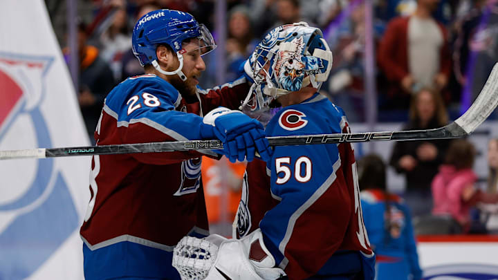 Jan 10, 2026; Denver, Colorado, USA; Colorado Avalanche defenseman Ilya Solovyov (28) celebrates with goaltender Trent Miner (50) after game against the Columbus Blue Jackets at Ball Arena. Mandatory Credit: Isaiah J. Downing-Imagn Images