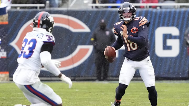 Caleb Williams looks downfield for a target in Sunday's win over the Giants.