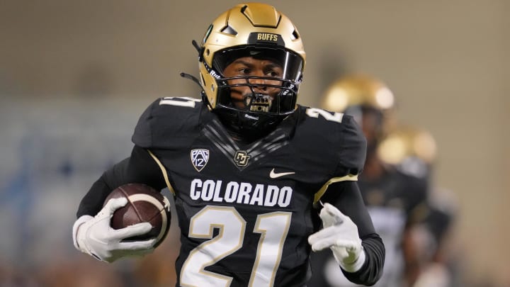 Sep 16, 2023; Boulder, Colorado, USA; Colorado Buffaloes safety Shilo Sanders (21) runs for a touchdown after making an interception against the Colorado State Rams during the first half at Folsom Field. Mandatory Credit: Andrew Wevers-USA TODAY Sports
