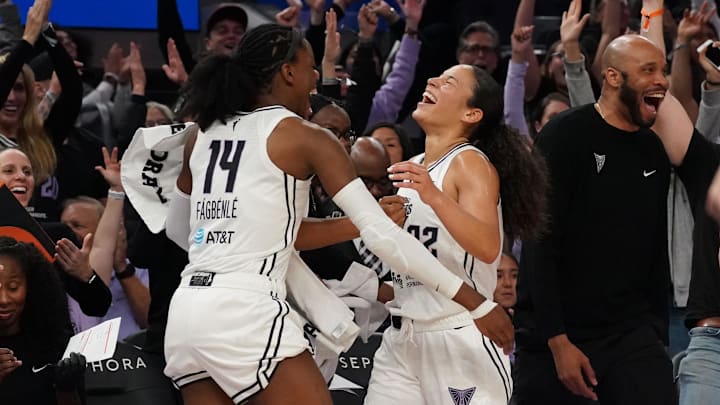 May 21, 2025; San Francisco, California, USA;  Golden State Valkyries center Temi Fagbenle (14) congratulates guard Veronica Burton (22) after Burton made a three point basket at the buzzer against the Washington Mystics in the second quarter at Chase Center. Mandatory Credit: David Gonzales-Imagn Images