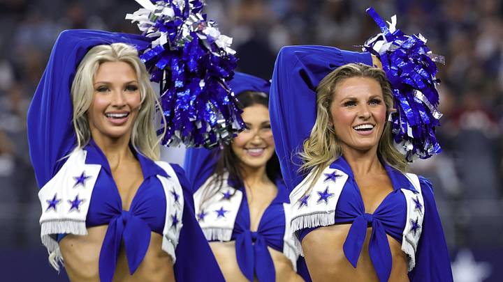 Dallas Cowboys Cheerleaders perform during the second half of a game against the Washington Commanders. Dallas Cowboys Cheerleaders perform during the second half of a game against the Washington Commanders.