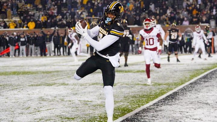 Luther Burden III makes a two-point conversion catch against Arkansas. The Bears were willing to look the other way on Burden's drop in stats his final year. Luther Burden III makes a two-point conversion catch against Arkansas. The Bears were willing to look the other way on Burden's drop in stats his final year.