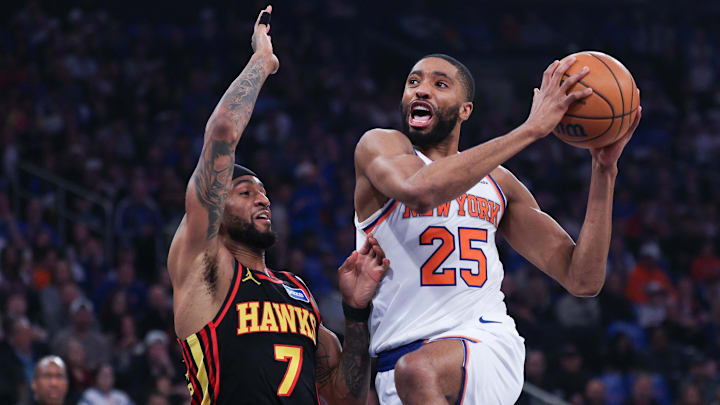 Apr 18, 2026; New York, New York, USA; New York Knicks guard Mikal Bridges (25) goes to the basket against Atlanta Hawks guard Nickeil Alexander-Walker (7) during the first quarter of the 2026 NBA Playoffs at Madison Square Garden.
