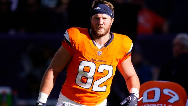 Dec 14, 2025; Denver, Colorado, USA; Denver Broncos tight end Adam Trautman (82) warms up before a game against the Green Bay Packers at Empower Field at Mile High. Mandatory Credit: Ron Chenoy-Imagn Images Dec 14, 2025; Denver, Colorado, USA; Denver Broncos tight end Adam Trautman (82) warms up before a game against the Green Bay Packers at Empower Field at Mile High. Mandatory Credit: Ron Chenoy-Imagn Images