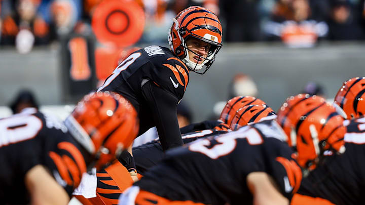 Dec 22, 2024; Cincinnati, Ohio, USA; Cincinnati Bengals quarterback Joe Burrow (9) prepares to snap the ball against the Cleveland Browns in the first half at Paycor Stadium. Mandatory Credit: Katie Stratman-Imagn Images