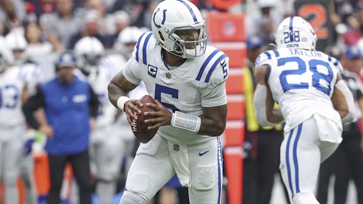 Oct 27, 2024; Houston, Texas, USA; Indianapolis Colts quarterback Anthony Richardson (5) rolls out of the pocket during the first quarter against the Houston Texans at NRG Stadium. Mandatory Credit: Troy Taormina-Imagn Images Oct 27, 2024; Houston, Texas, USA; Indianapolis Colts quarterback Anthony Richardson (5) rolls out of the pocket during the first quarter against the Houston Texans at NRG Stadium. Mandatory Credit: Troy Taormina-Imagn Images