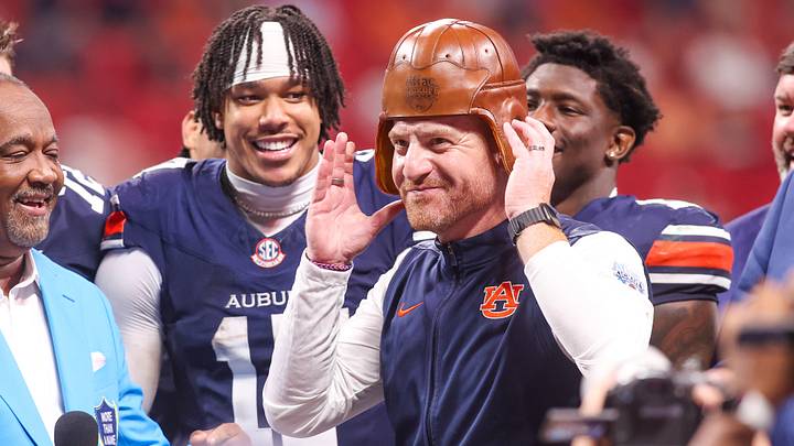 Sep 5, 2026; Atlanta, Georgia, USA; Auburn Tigers head coach Alex Golesh wears the old leather helmet after a victory over the Baylor Bears at Mercedes-Benz Stadium. Mandatory Credit: Brett Davis-Imagn Images Sep 5, 2026; Atlanta, Georgia, USA; Auburn Tigers head coach Alex Golesh wears the old leather helmet after a victory over the Baylor Bears at Mercedes-Benz Stadium. Mandatory Credit: Brett Davis-Imagn Images