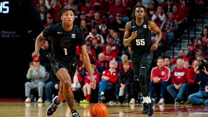 Dec 10, 2023; Lincoln, Nebraska, USA; Michigan State Spartans guard Jeremy Fears Jr. (1) and forward Coen Carr (55) during the second half against the Nebraska Cornhuskers at Pinnacle Bank Arena. Mandatory Credit: Dylan Widger-Imagn Images