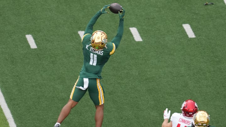 Nov 29, 2025; Waco, Texas, USA; Baylor Bears linebacker Keaton Thomas (11) intercepts a pass intended for Houston Cougars running back Dean Connors (44) during the first half at McLane Stadium. Mandatory Credit: Chris Jones-Imagn Images Nov 29, 2025; Waco, Texas, USA; Baylor Bears linebacker Keaton Thomas (11) intercepts a pass intended for Houston Cougars running back Dean Connors (44) during the first half at McLane Stadium. Mandatory Credit: Chris Jones-Imagn Images