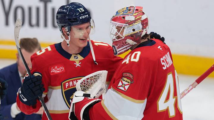 Florida Panthers center Anton Lundell (15) celebrates with goaltender Akira Schmid (40) after the game against the Winnipeg Jets at Amerant Bank Arena. Mandatory Credit: Sam Navarro-Imagn Images