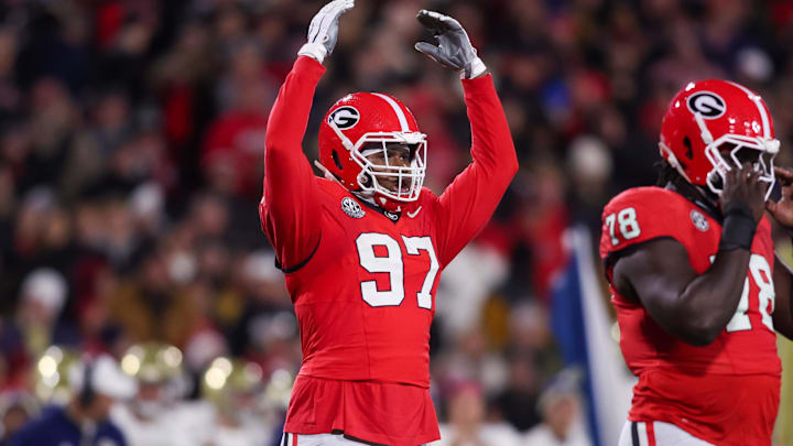Nov 29, 2024; Athens, Georgia, USA; Georgia Bulldogs defensive lineman Warren Brinson (97) shows emotion against the Georgia Tech Yellow Jackets in the first quarter at Sanford Stadium. Mandatory Credit: Brett Davis-Imagn Images Nov 29, 2024; Athens, Georgia, USA; Georgia Bulldogs defensive lineman Warren Brinson (97) shows emotion against the Georgia Tech Yellow Jackets in the first quarter at Sanford Stadium. Mandatory Credit: Brett Davis-Imagn Images