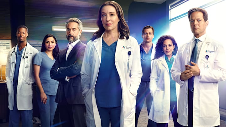 L-R: Patrick Walker, Anya Banerjee, Omar Metwally, Molly Parker, Jon Ecker, Amirah Vann, and Scott Wolf in Doc season 1 poster