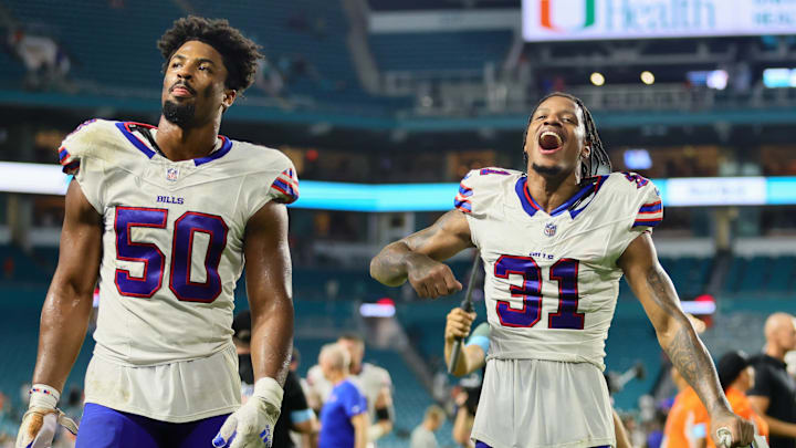 Sep 12, 2024; Miami Gardens, Florida, USA; Buffalo Bills cornerback Rasul Douglas (31) and defensive end Greg Rousseau (50) walk off the field after the game against the Miami Dolphins at Hard Rock Stadium.