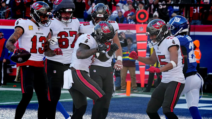 East Rutherford, NJ -- November 24, 2024 -- Tampa celebrates a TD by Bucky Irving in the first half as the Tampa Bay Buccaneers came to MetLife Stadium to play the New York Giants.