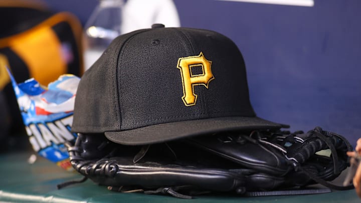 Sep 8, 2023; Atlanta, Georgia, USA; A detailed view of a Pittsburgh Pirates hat and glove before a game against the Pittsburgh Pirates in the first inning at Truist Park. Mandatory Credit: Brett Davis-Imagn Images Sep 8, 2023; Atlanta, Georgia, USA; A detailed view of a Pittsburgh Pirates hat and glove before a game against the Pittsburgh Pirates in the first inning at Truist Park. Mandatory Credit: Brett Davis-Imagn Images