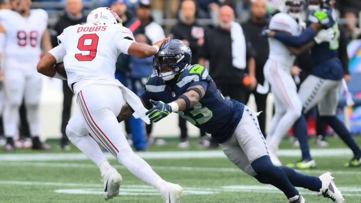 Oct 22, 2023; Seattle, Washington, USA; Seattle Seahawks safety Jamal Adams (33) dives for Arizona Cardinals quarterback Joshua Dobbs (9) during the game at Lumen Field. Mandatory Credit: Steven Bisig-USA TODAY Sports Oct 22, 2023; Seattle, Washington, USA; Seattle Seahawks safety Jamal Adams (33) dives for Arizona Cardinals quarterback Joshua Dobbs (9) during the game at Lumen Field. Mandatory Credit: Steven Bisig-USA TODAY Sports