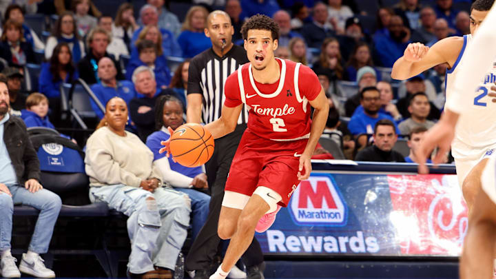 Feb 9, 2025; Memphis, Tennessee, USA; Temple Owls forward Steve Settle III (2) drives to the basket against the Memphis Tigers during the second half at FedExForum. Mandatory Credit: Wesley Hale-Imagn Images