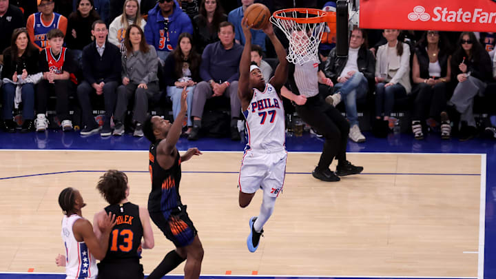 Dec 19, 2025; New York, New York, USA; Philadelphia 76ers guard VJ Edgecombe (77) drives to the basket against New York Knicks forward Og Anunoby (8) during the fourth quarter at Madison Square Garden. Mandatory Credit: Brad Penner-Imagn Images