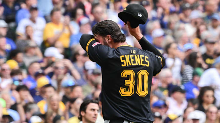 Jun 25, 2025; Milwaukee, Wisconsin, USA; Pittsburgh Pirates starting pitcher Paul Skenes reacts after giving up a run in the second inning against the Milwaukee Brewers at American Family Field. Mandatory Credit: Benny Sieu-Imagn Images