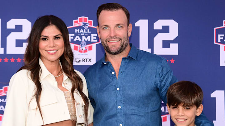 Jun 12, 2024; Foxborough, MA, USA; NFL coach Wes Welker poses with his wife Anna and son at the New England Patriots Hall of Fame induction ceremony for Tom Brady at Gillette Stadium. Mandatory Credit: Eric Canha-Imagn Images
