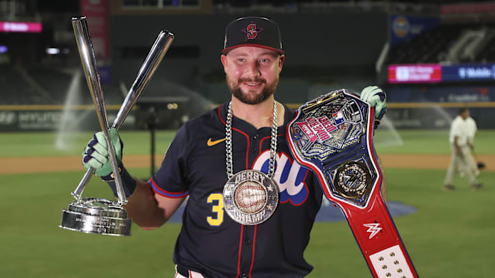 Jul 14, 2025; Atlanta, GA, USA; Seattle Mariners catcher Cal Raleigh (29) holds the trophy after winning the 2025 Home Run Derby at Truist Park. Mandatory Credit: Brett Davis-Imagn Images