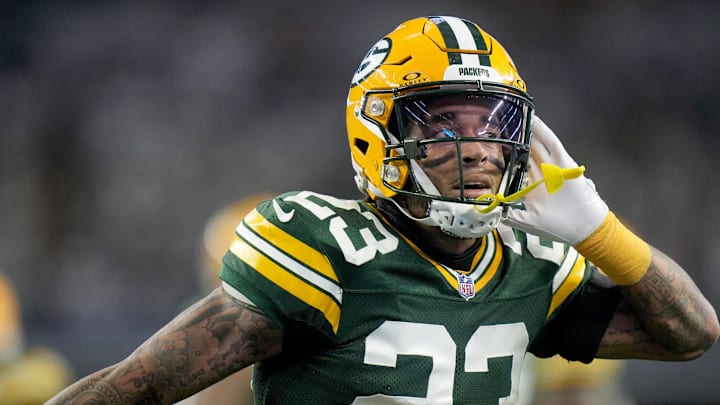 Green Bay Packers cornerback Jaire Alexander (23) reacts after intercepting a pass during the first quarter of the wild card playoff game against the Dallas Cowboys Sunday, January 14, 2024 at AT&T Stadium in Arlington, Texas.