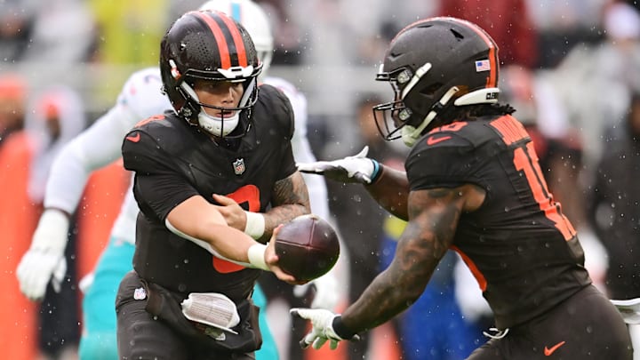 Oct 19, 2025; Cleveland, Ohio, USA; Cleveland Browns quarterback Dillon Gabriel (8) hands off to running back Quinshon Judkins (10) against the Miami Dolphins during the first quarter at Huntington Bank Field. Mandatory Credit: Ken Blaze-Imagn Images