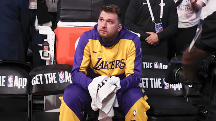Apr 9, 2025; Dallas, Texas, USA;  Los Angeles Lakers guard Luka Doncic (77) reacts while watching a tribute video before the game against the Dallas Mavericks at American Airlines Center. Mandatory Credit: Kevin Jairaj-Imagn Images