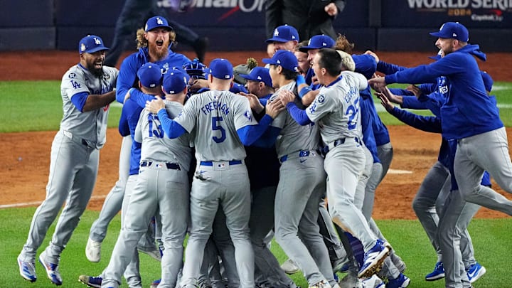 The Los Angeles Dodgers celebrate after beating the New York Yankees in Game 5 to win the World Series at Yankee Stadium.