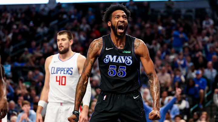 Dec 20, 2023; Dallas, Texas, USA;  Dallas Mavericks forward Derrick Jones Jr. (55) reacts after