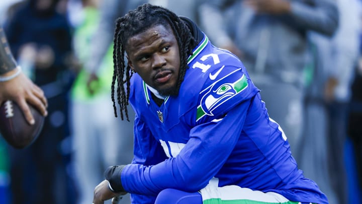 Seattle Seahawks linebacker Jerome Baker (17) takes a break during pregame warmups against the San Francisco 49ers at Lumen Field.