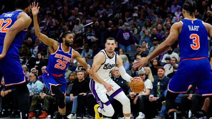 Mar 10, 2025; Sacramento, California, USA; Sacramento Kings guard Zach LaVine (8) dribbles the ball against New York Knicks forward Mikal Bridges (25) during the third quarter at Golden 1 Center. Mandatory Credit: Sergio Estrada-Imagn Images Mar 10, 2025; Sacramento, California, USA; Sacramento Kings guard Zach LaVine (8) dribbles the ball against New York Knicks forward Mikal Bridges (25) during the third quarter at Golden 1 Center. Mandatory Credit: Sergio Estrada-Imagn Images