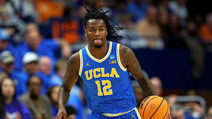 Mar 22, 2025; Lexington, KY, USA; UCLA Bruins guard Sebastian Mack (12) brings the ball up court during the first half against the Tennessee Volunteers in the second round of the NCAA Tournament at Rupp Arena. Mandatory Credit: Jordan Prather-Imagn Images Mar 22, 2025; Lexington, KY, USA; UCLA Bruins guard Sebastian Mack (12) brings the ball up court during the first half against the Tennessee Volunteers in the second round of the NCAA Tournament at Rupp Arena. Mandatory Credit: Jordan Prather-Imagn Images