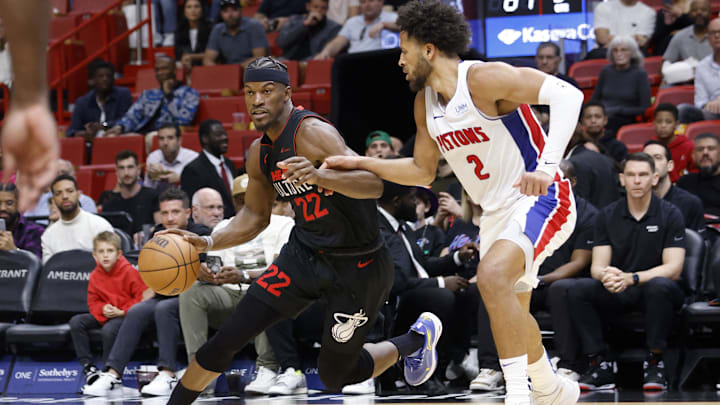 Mar 5, 2024; Miami, Florida, USA; Detroit Pistons guard Cade Cunningham (2) defends Miami Heat forward Jimmy Butler (22) during the second half at Kaseya Center. Mandatory Credit: Rhona Wise-Imagn Images
