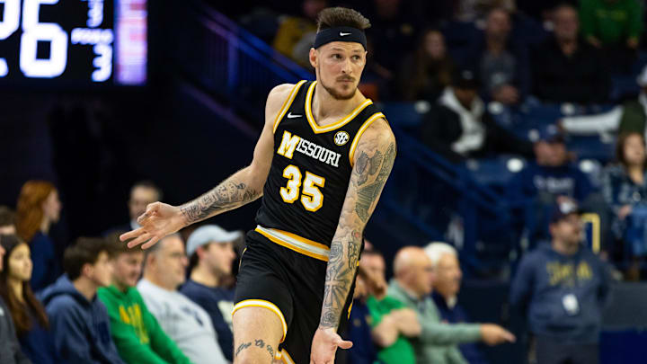 Dec 2, 2025; South Bend, Indiana, USA; Missouri Tigers guard Jacob Crews (35) celebrates a 3-point shot against the Notre Dame Fighting Irish during the first half at Purcell Pavilion at the Joyce Center. Mandatory Credit: Michael Caterina-Imagn Images Dec 2, 2025; South Bend, Indiana, USA; Missouri Tigers guard Jacob Crews (35) celebrates a 3-point shot against the Notre Dame Fighting Irish during the first half at Purcell Pavilion at the Joyce Center. Mandatory Credit: Michael Caterina-Imagn Images