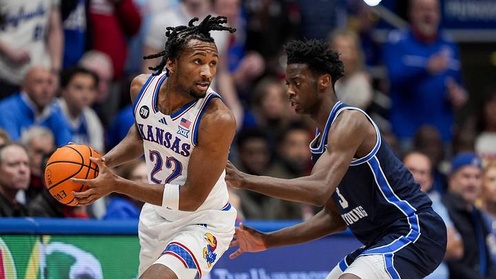 Jan 24, 2026; Columbia, Missouri, USA; Kansas Jayhawks guard Darryn Peterson (22) looks to pass against BYU Cougars forward AJ Dybantsa (3) during the first half at Mizzou Arena. Mandatory Credit: Jay Biggerstaff-Imagn Images Jan 24, 2026; Columbia, Missouri, USA; Kansas Jayhawks guard Darryn Peterson (22) looks to pass against BYU Cougars forward AJ Dybantsa (3) during the first half at Mizzou Arena. Mandatory Credit: Jay Biggerstaff-Imagn Images