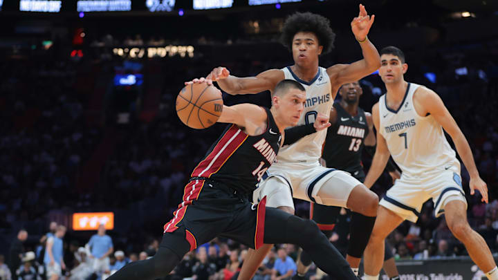 Apr 3, 2025; Miami, Florida, USA; Miami Heat guard Tyler Herro (14) drives to the basket against Memphis Grizzlies forward Jaylen Wells (0) during the third quarter at Kaseya Center. Mandatory Credit: Sam Navarro-Imagn Images Apr 3, 2025; Miami, Florida, USA; Miami Heat guard Tyler Herro (14) drives to the basket against Memphis Grizzlies forward Jaylen Wells (0) during the third quarter at Kaseya Center. Mandatory Credit: Sam Navarro-Imagn Images