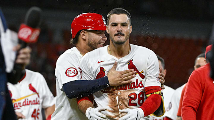 Aug 21, 2024; St. Louis, Missouri, USA;  St. Louis Cardinals third baseman Nolan Arenado (28) celebrates with catcher Willson Contreras (40) after hitting a walk-off grand slam against the Milwaukee Brewers during the tenth inning at Busch Stadium. Mandatory Credit: Jeff Curry-Imagn Images