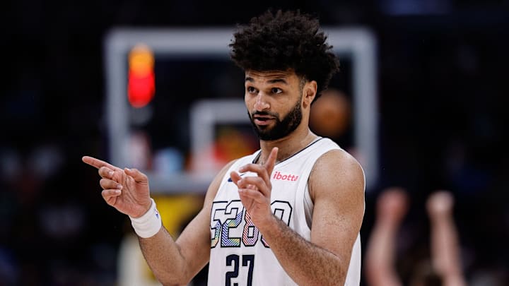 Mar 26, 2025; Denver, Colorado, USA; Denver Nuggets guard Jamal Murray (27) gestures in the third quarter against the Milwaukee Bucks at Ball Arena. Mandatory Credit: Isaiah J. Downing-Imagn Images