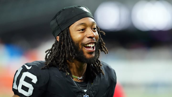 Dec 14, 2023; Paradise, Nevada, USA;  Las Vegas Raiders wide receiver Jakobi Meyers (16) smiles after the game against the Los Angeles Chargers at Allegiant Stadium. Mandatory Credit: Stephen R. Sylvanie-Imagn Images