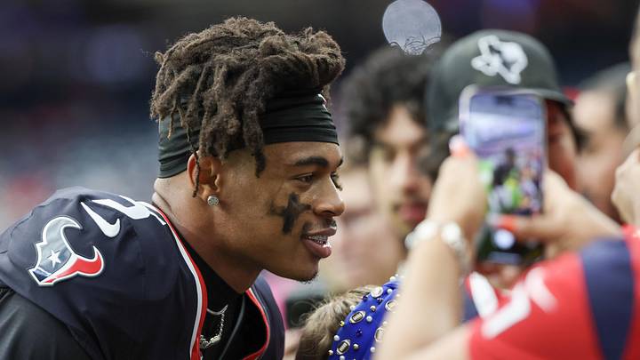 Oct 27, 2024; Houston, Texas, USA;  Houston Texans wide receiver Tank Dell (3) takes a photo with fans before playing against the Indianapolis Colts at NRG Stadium. Mandatory Credit: Thomas Shea-Imagn Images